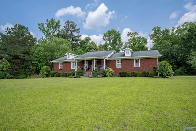 208 Burgess Ave, Rainsville, AL 35986 - ranch-style home with a front lawn, brick siding, and a porch