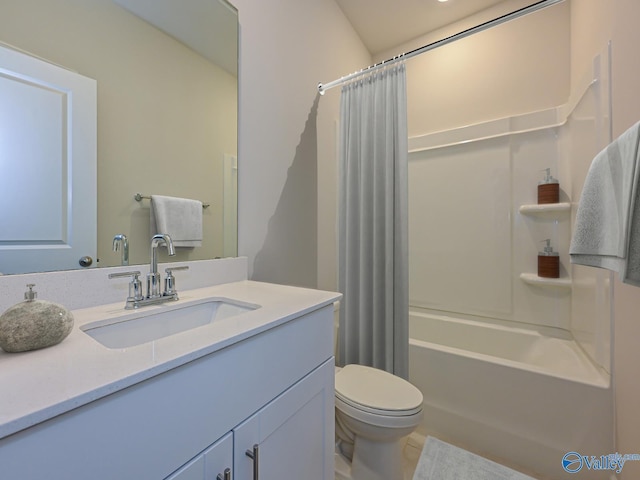 bathroom featuring toilet, vanity, and shower / tub combo