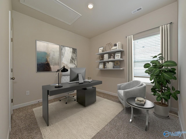 office area featuring attic access, baseboards, and carpet flooring
