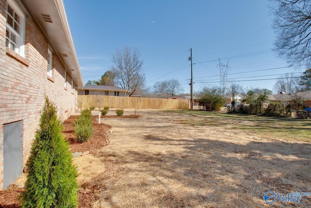 view of yard with fence