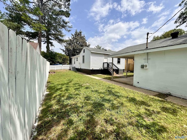 view of yard with a fenced backyard