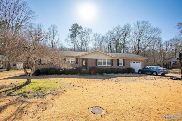 single story home with a garage