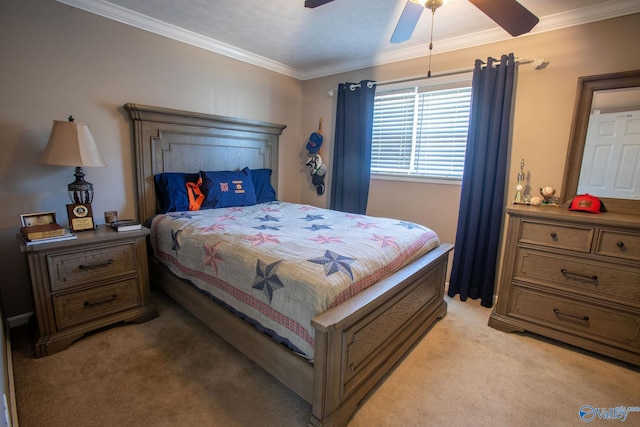 carpeted bedroom with ceiling fan and ornamental molding