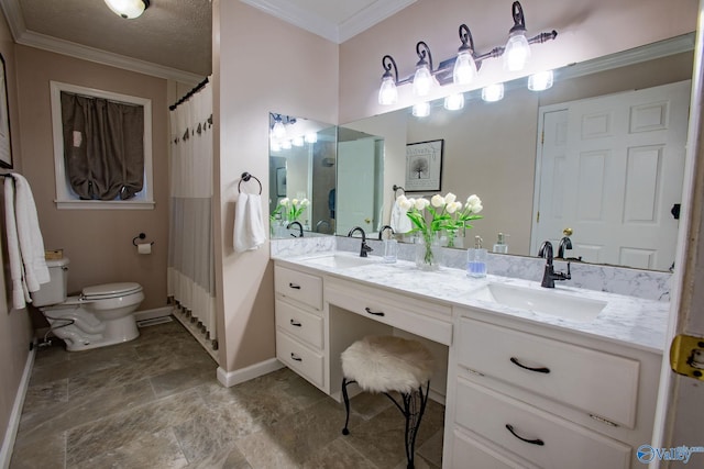 bathroom featuring vanity, crown molding, and toilet