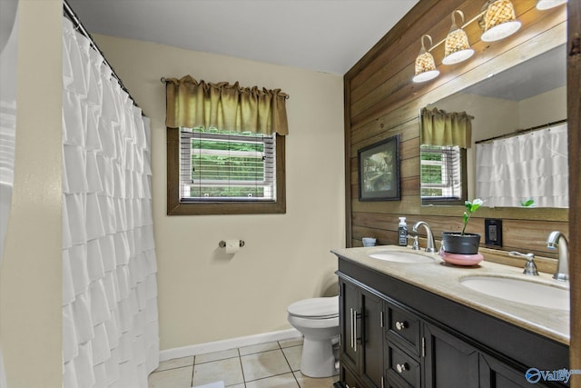 216 Mcdonald Ln, Guntersville, AL 35976 - bathroom with healthy amount of natural light, double vanity, tile patterned floors, wood walls, and a shower with shower curtain