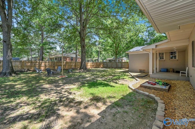 view of yard featuring a fenced backyard and a patio area