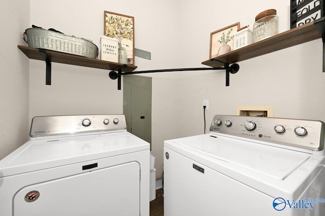 clothes washing area featuring laundry area and washer and dryer