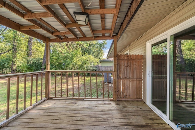 wooden deck with a yard