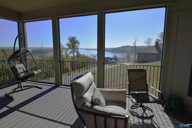 sunroom with a water view