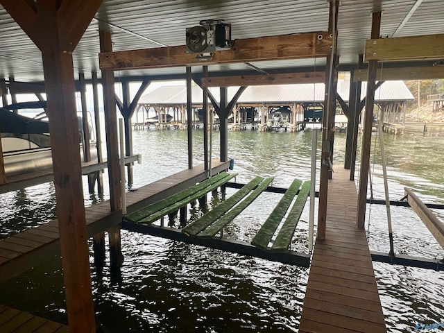 view of dock with a water view