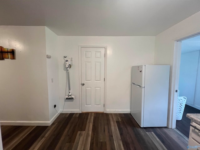 corridor featuring dark wood-type flooring