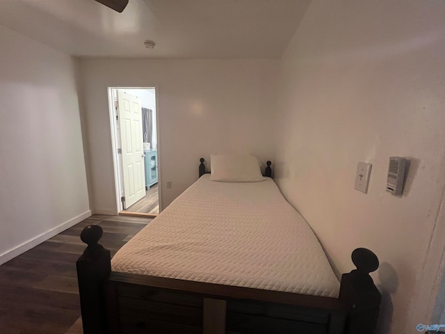 bedroom featuring dark wood-type flooring and ceiling fan