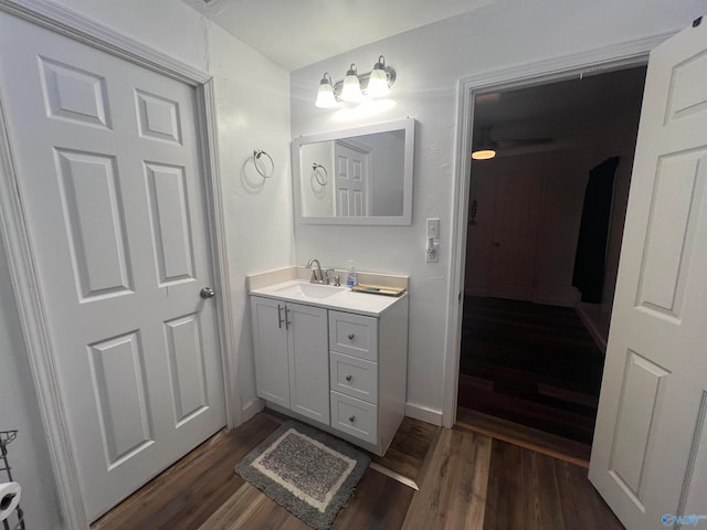 bathroom featuring vanity and wood-type flooring