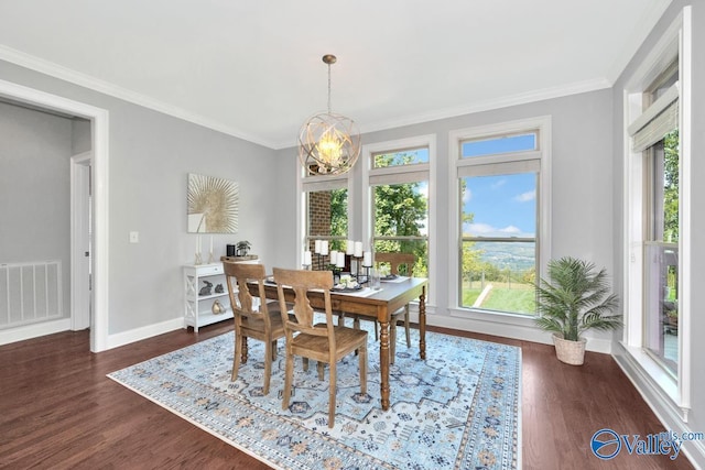 dining space featuring a wealth of natural light, dark wood-type flooring, and visible vents