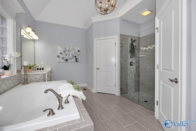 bathroom featuring a stall shower, visible vents, ornamental molding, vanity, and a bath