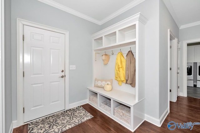 mudroom featuring ornamental molding, independent washer and dryer, dark wood finished floors, and baseboards