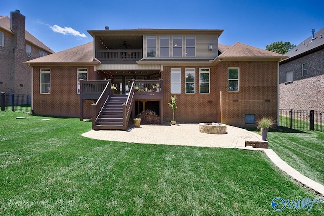 back of house with ceiling fan, a patio, a fire pit, fence, and stairs