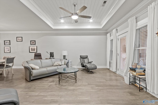 living room with ceiling fan, a raised ceiling, wooden ceiling, and light hardwood / wood-style flooring