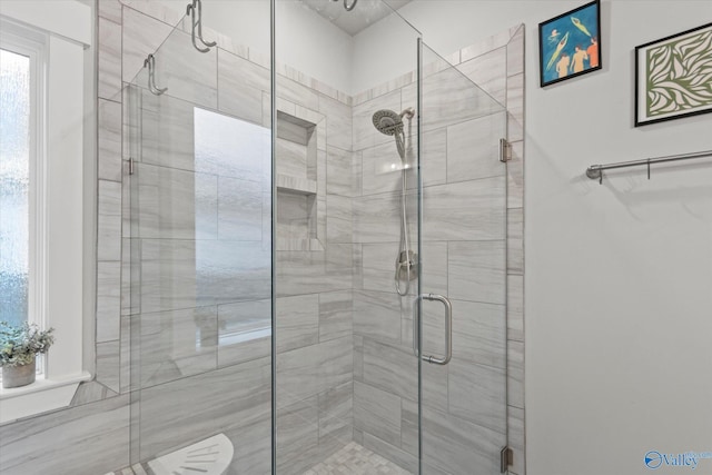 bathroom with an enclosed shower