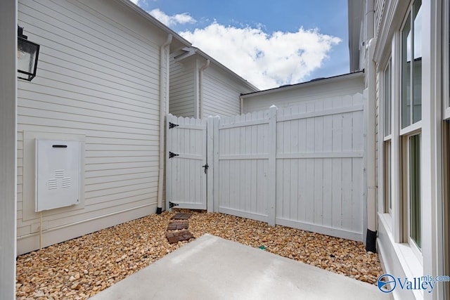 property entrance featuring a patio