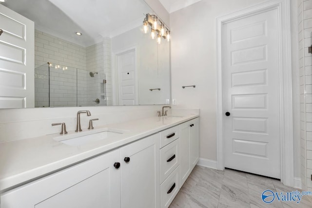 bathroom featuring vanity and a shower with shower door