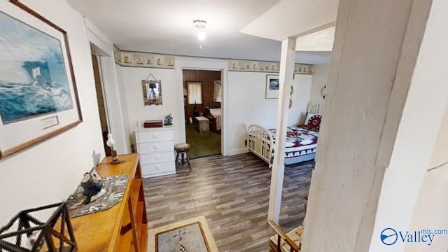 hallway with wood-type flooring