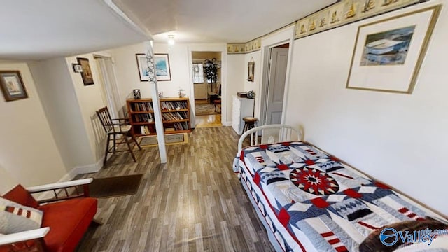 bedroom featuring hardwood / wood-style floors