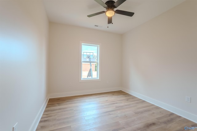 unfurnished room featuring ceiling fan and light hardwood / wood-style floors