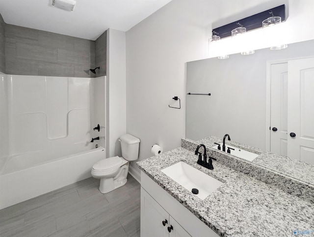 full bathroom featuring vanity, toilet, and shower / bathing tub combination