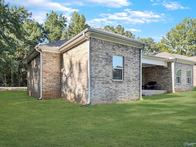 view of property exterior featuring a yard