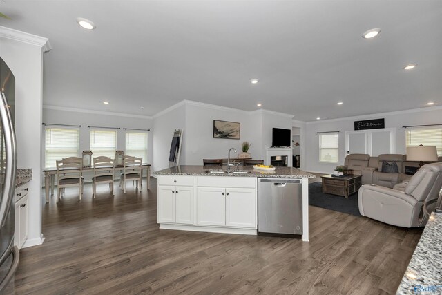 kitchen with dishwasher, dark hardwood / wood-style flooring, a wealth of natural light, and sink