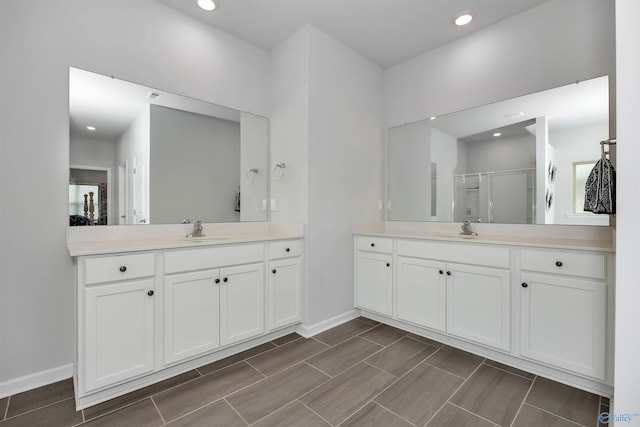 bathroom with vanity and walk in shower