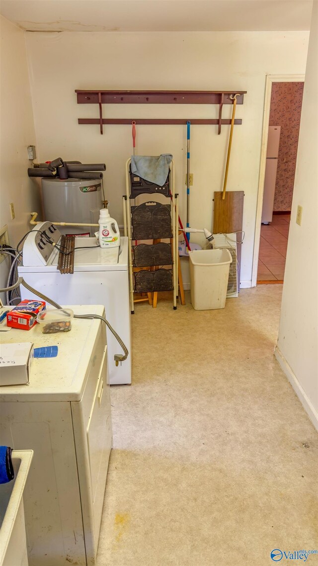2808 Elmore Rd, Huntsville, AL 35805 - laundry area featuring washer and dryer and carpet floors