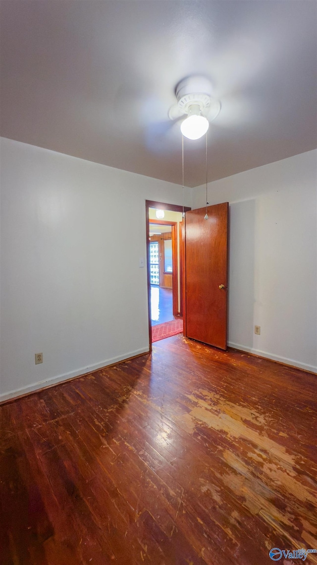 2808 Elmore Rd, Huntsville, AL 35805 - spare room featuring wood-type flooring and baseboards
