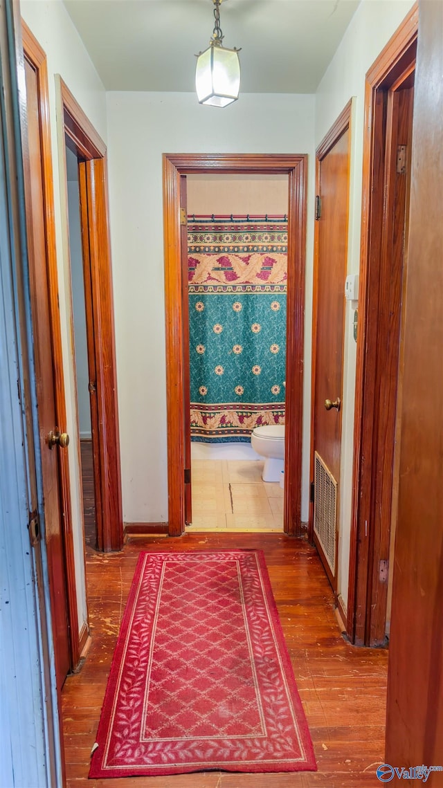 2808 Elmore Rd, Huntsville, AL 35805 - hall featuring wood finished floors