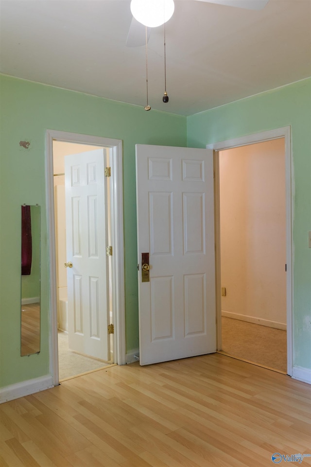 2808 Elmore Rd, Huntsville, AL 35805 - unfurnished bedroom featuring light wood-style flooring and baseboards