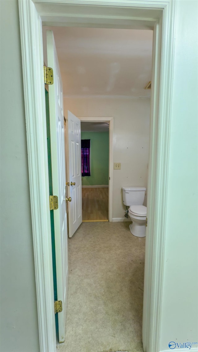 2808 Elmore Rd, Huntsville, AL 35805 - bathroom featuring toilet and baseboards