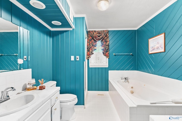 bathroom featuring a bathtub, toilet, tile patterned flooring, and crown molding