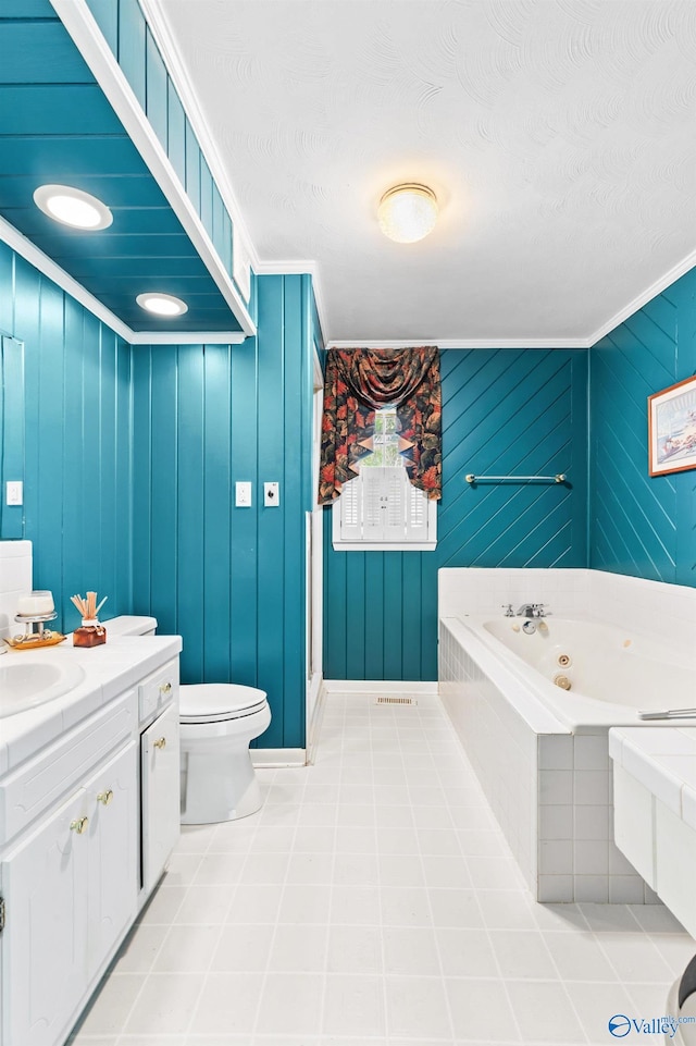 bathroom with a bathtub, wood walls, toilet, and vanity