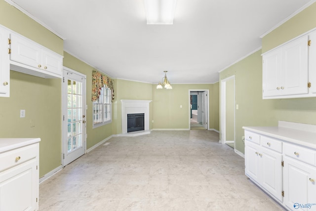 unfurnished living room with ornamental molding