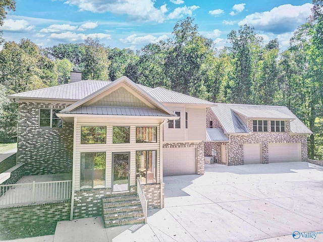 view of front of property featuring a garage