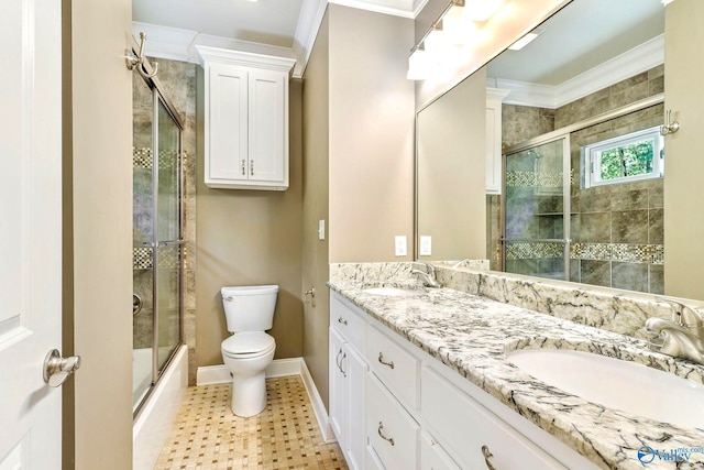 full bathroom with toilet, enclosed tub / shower combo, tile patterned floors, vanity, and crown molding