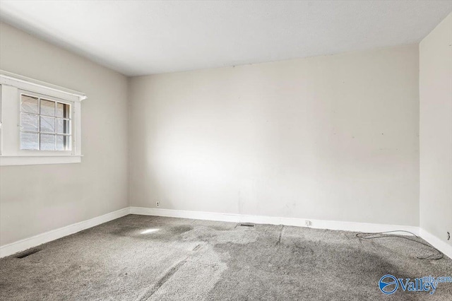 view of carpeted spare room