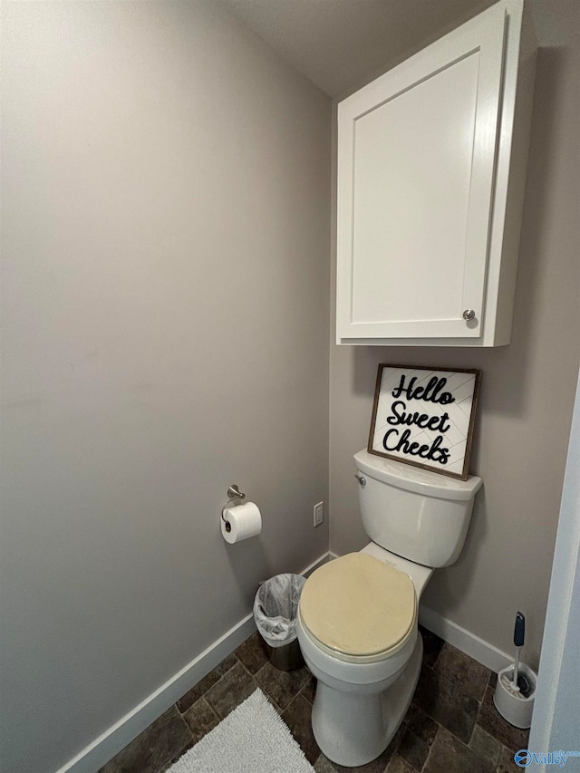 bathroom featuring toilet