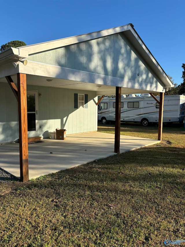 view of car parking with a yard