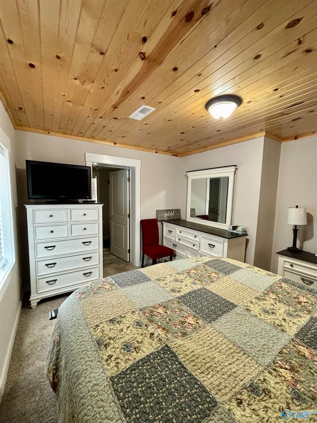 carpeted bedroom featuring crown molding and wood ceiling