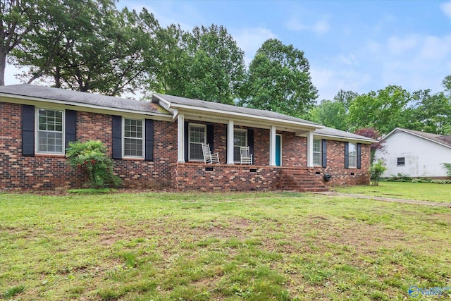 100 Cumberland Cir, Scottsboro, AL 35769 - ranch-style home with a front yard, a porch, and brick siding