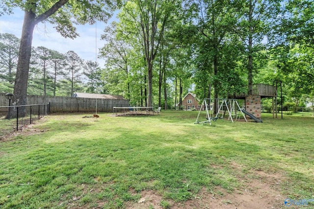 100 Cumberland Cir, Scottsboro, AL 35769 - view of yard featuring a playground and fence