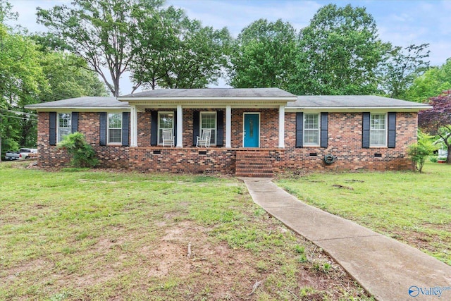 100 Cumberland Cir, Scottsboro, AL 35769 - ranch-style house with brick siding, crawl space, covered porch, and a front yard