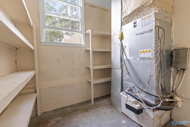 utility room with heating unit